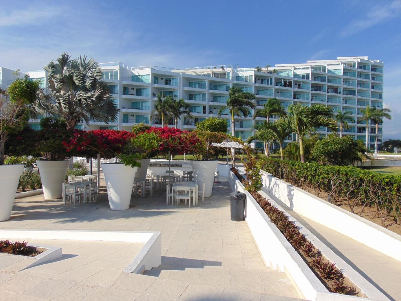 Апартаменты Vallarta Acqua Flamingos Бусериас Экстерьер фото